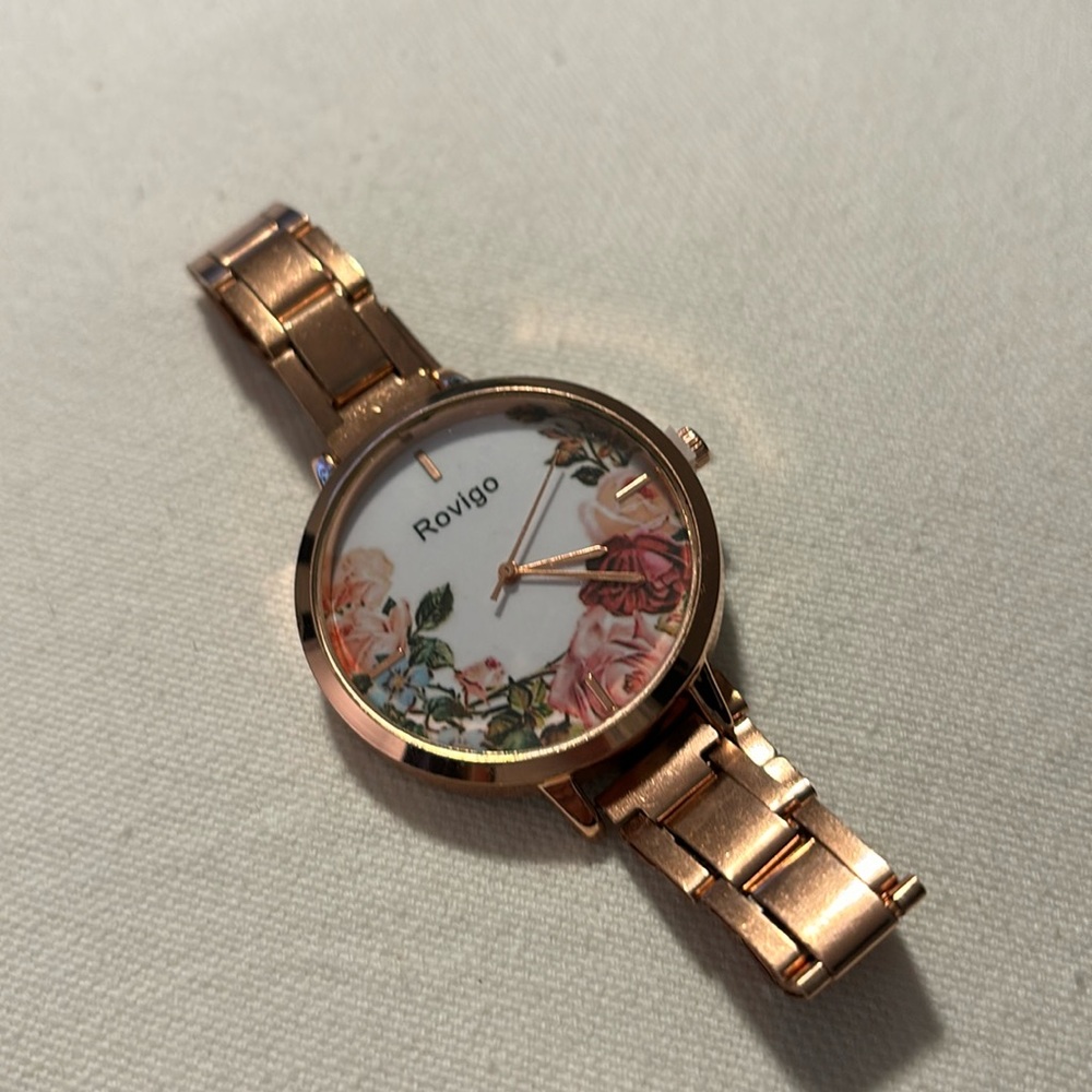Rovigo Watch in Rose Gold Tone with a Flowered Face and Snap Catch 8 Inch